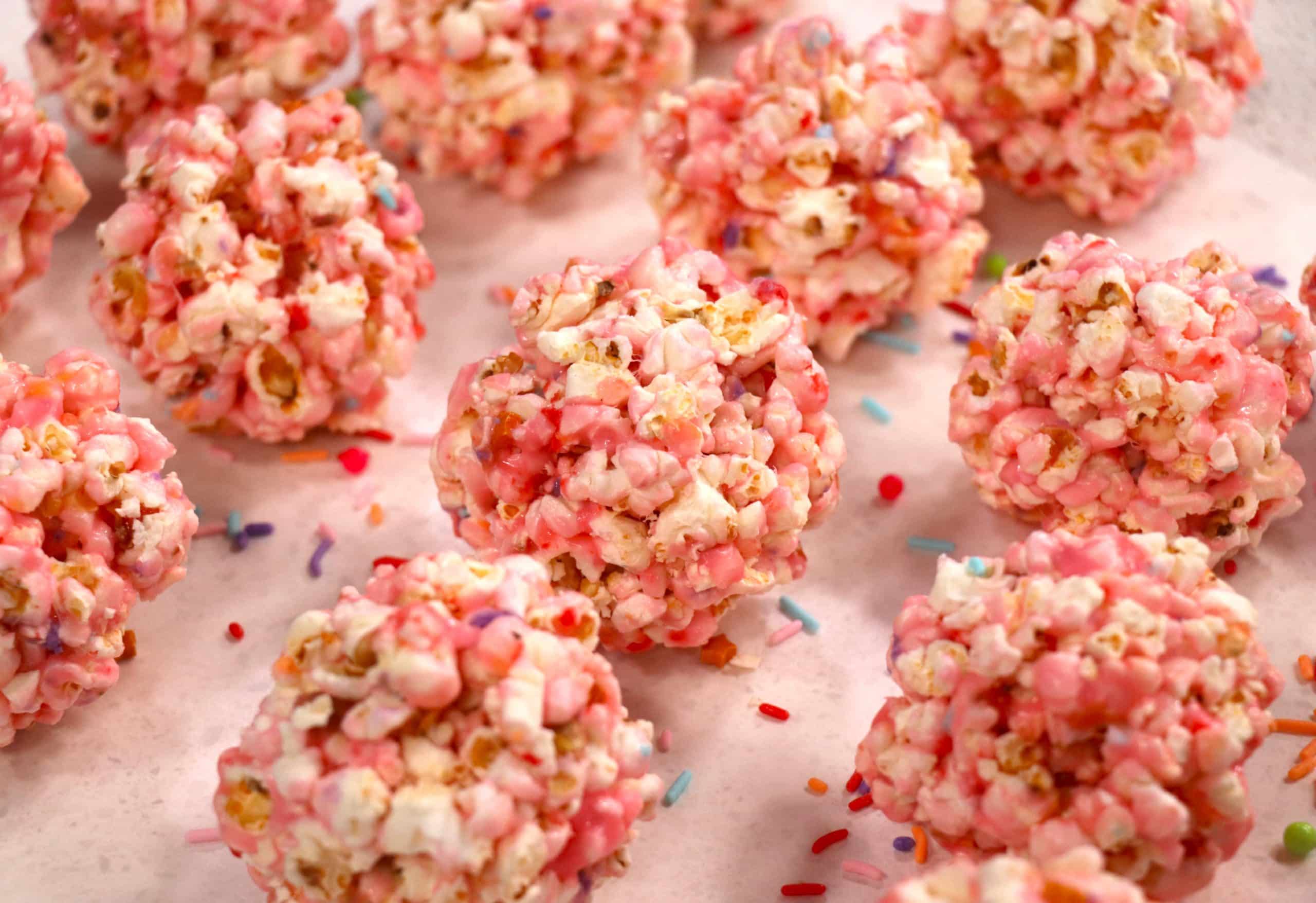 Featured image for “Pink Honey Marshmallow Popcorn Balls”